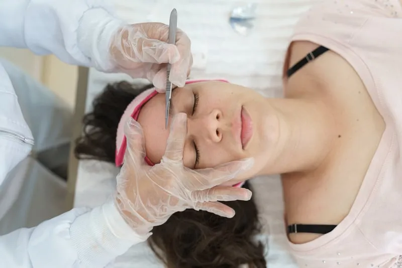 Facial treatment performed with professional skincare products